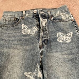 butterfly design jeans by Pacsun